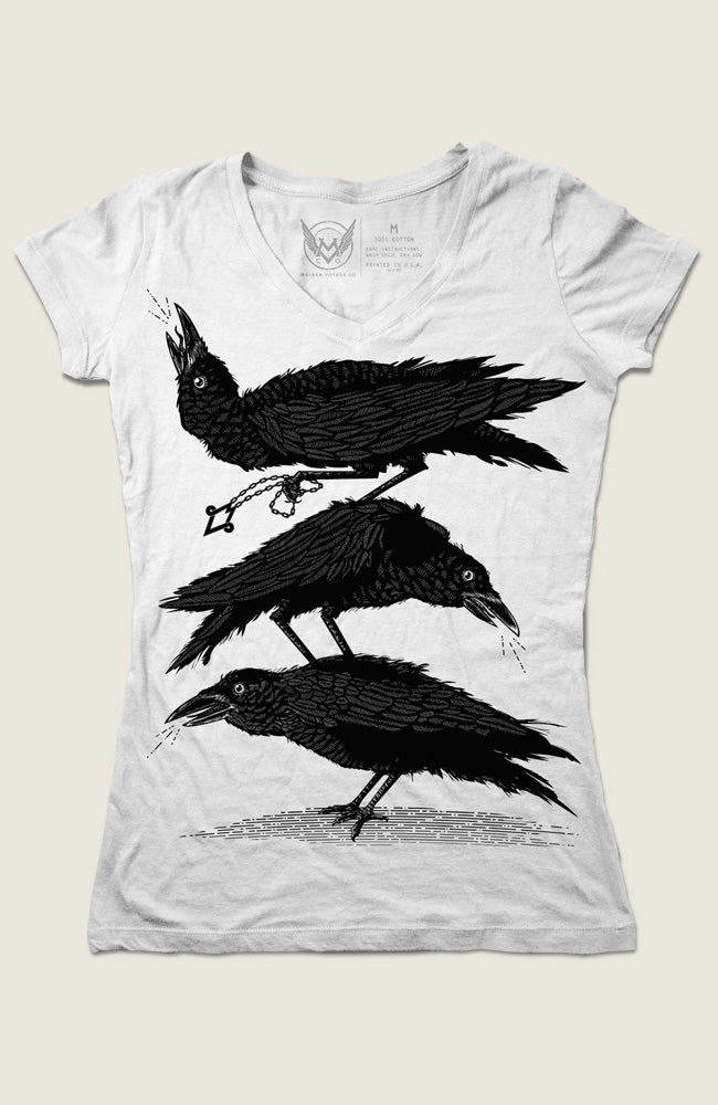 A white V-neck t-shirt with a graphic print of three black crows on the front.